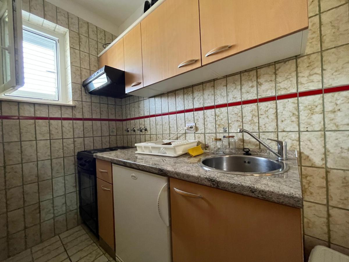 Apartments Vuksan ราบ ภายนอก รูปภาพ